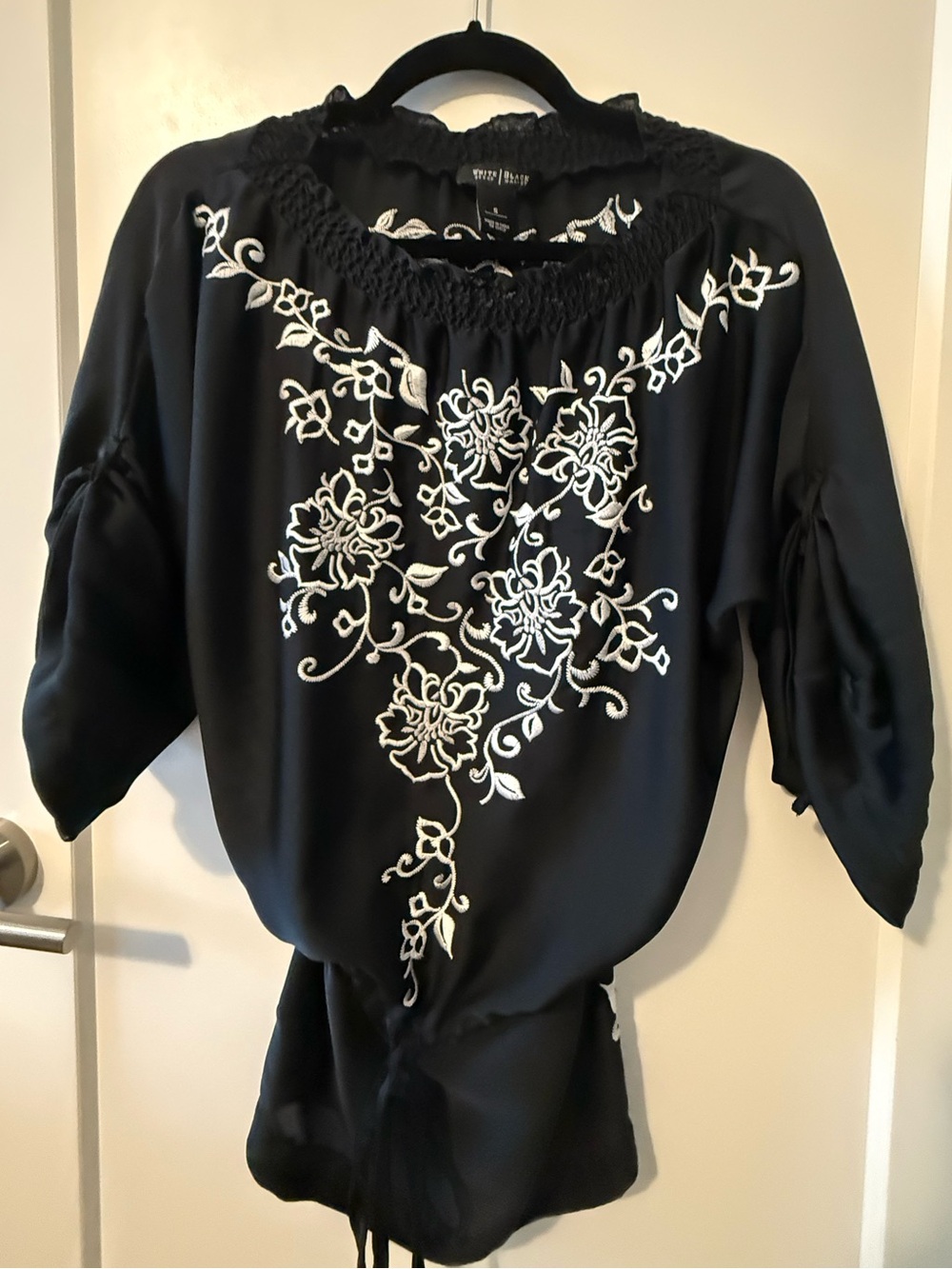 White House Black Market Black Blouse with White Floral Embroidery